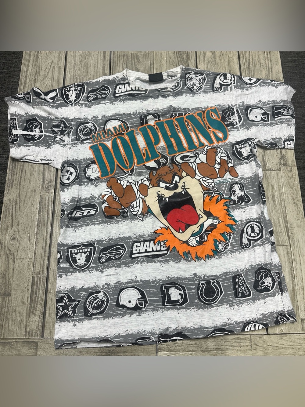 Vintage 1991 Changes Miami Dolphins Tasmania AOP Tshirt L Made USA Single Stitch